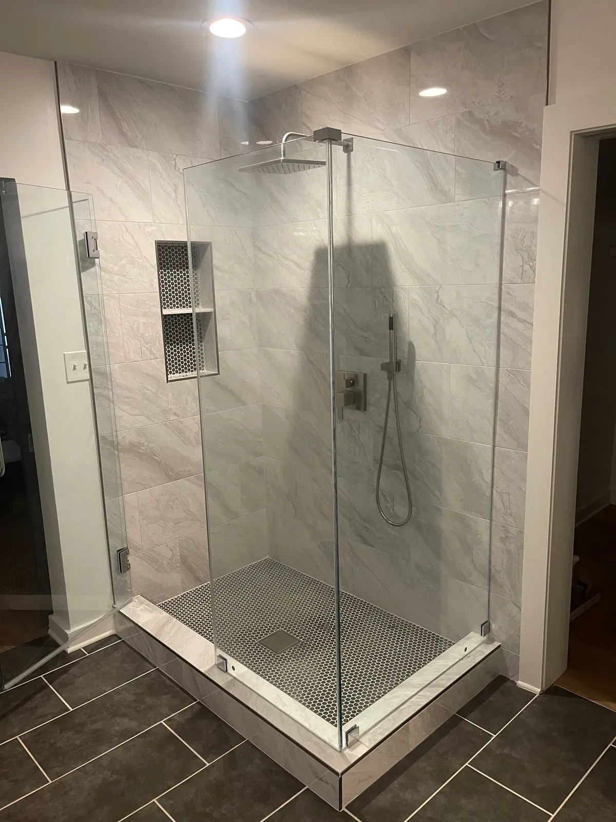 Modern bathroom with sleek corner shower enclosure